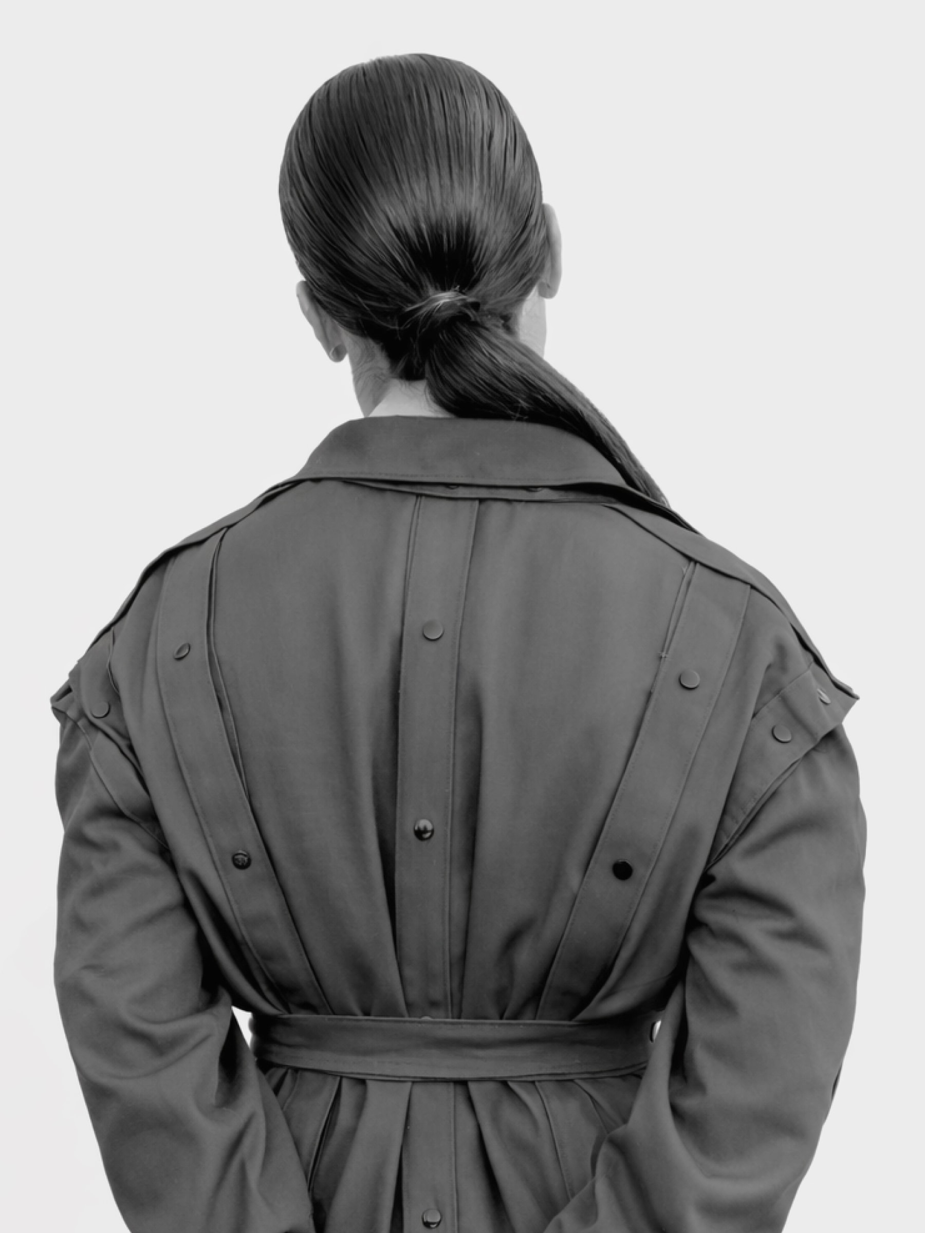 Module collection presenting a modular trench coat in grey twill